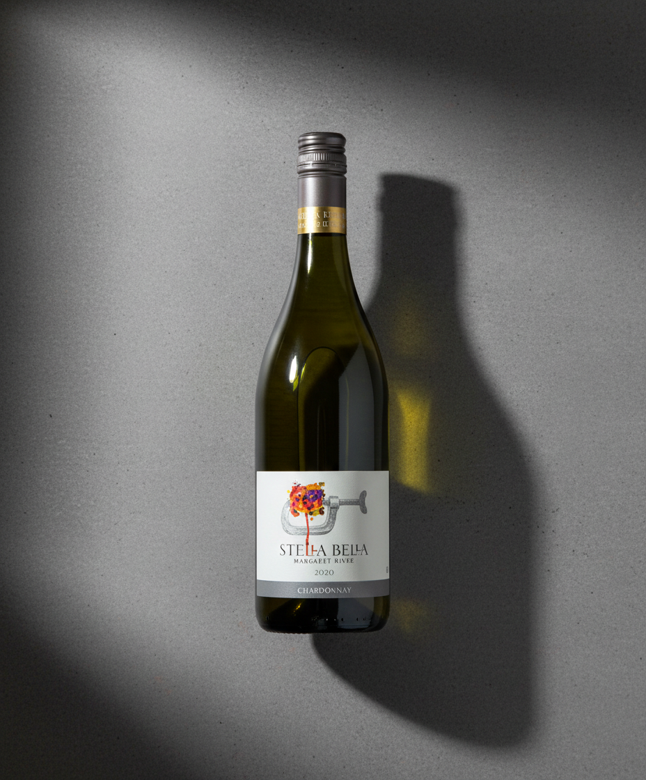 Stella Bella Chardonnay 2023 bottle in portrait with shadow on gray textured surface, gallery position 5