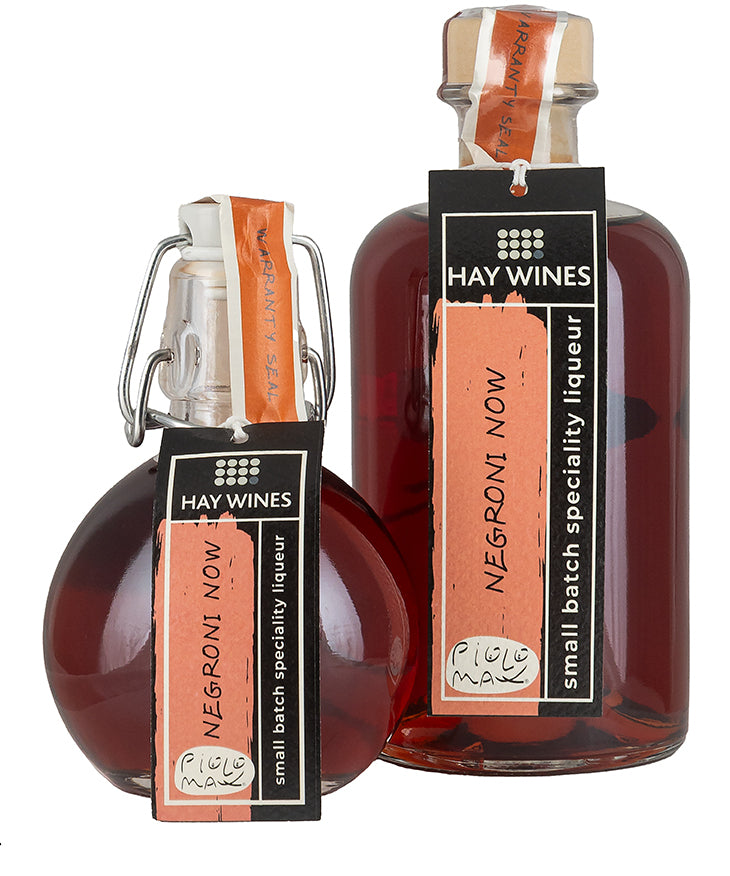 Hay Wines Negroni Now Premium Cocktail bottles with labels showcasing small batch specialty liqueur from Italy