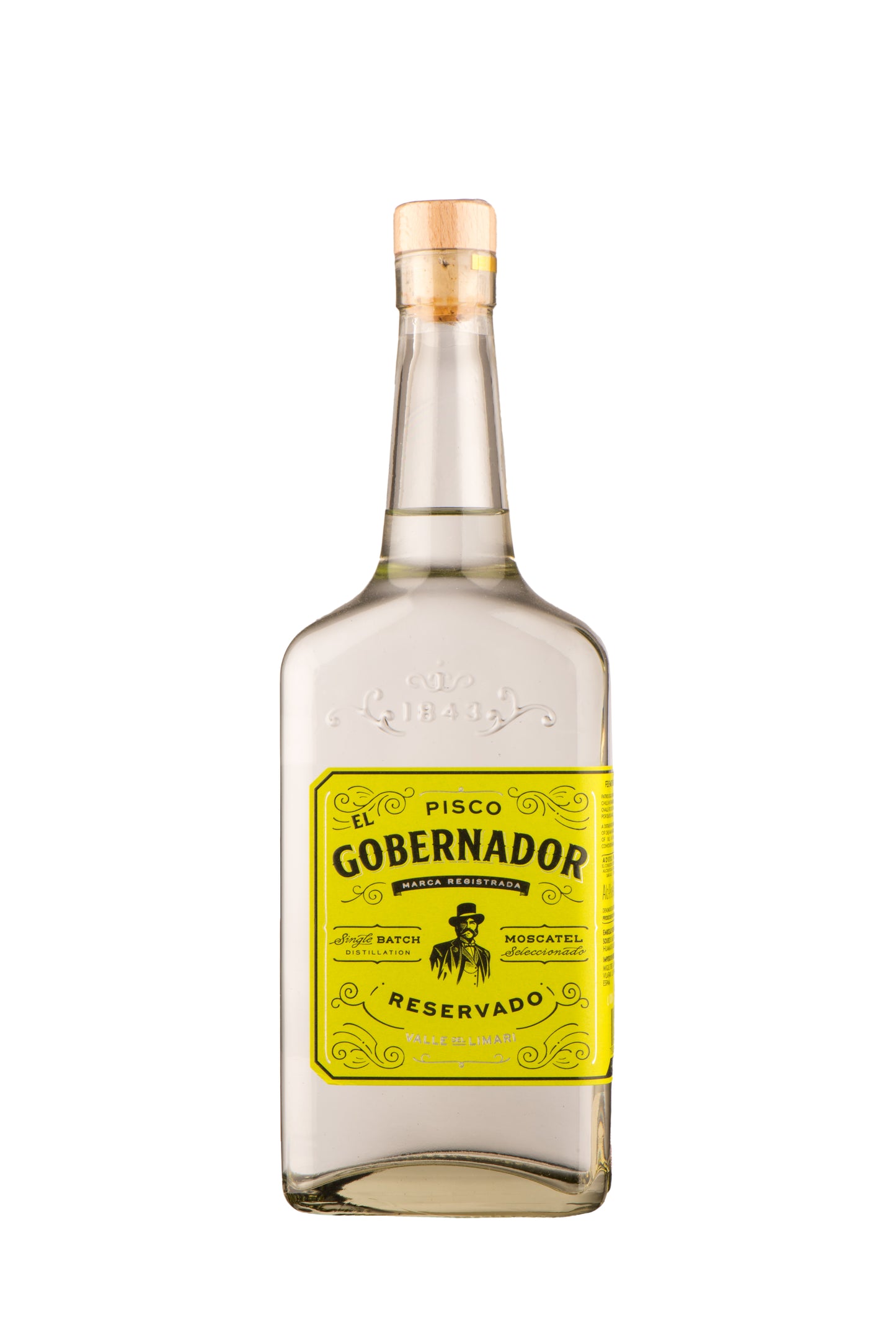 El Gobernador Pisco bottle with yellow label showcasing Chilean grape spirits by Miguel Torres, fine wine producer