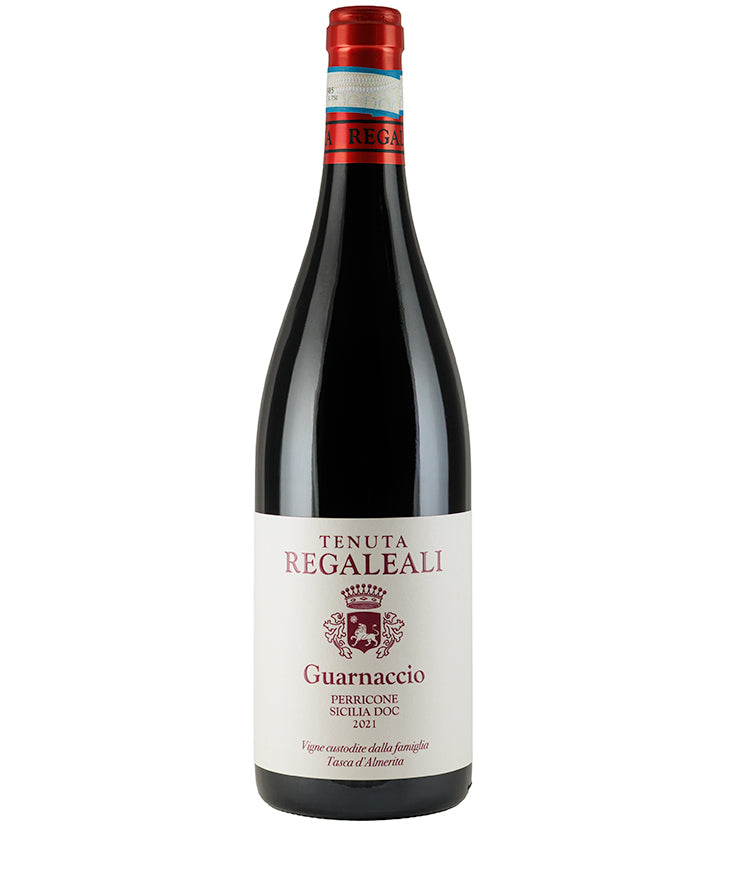 Bottle of Tenuta Regaleali Tasca Guarnaccio Perricone 2022 red wine with label and red foil top.