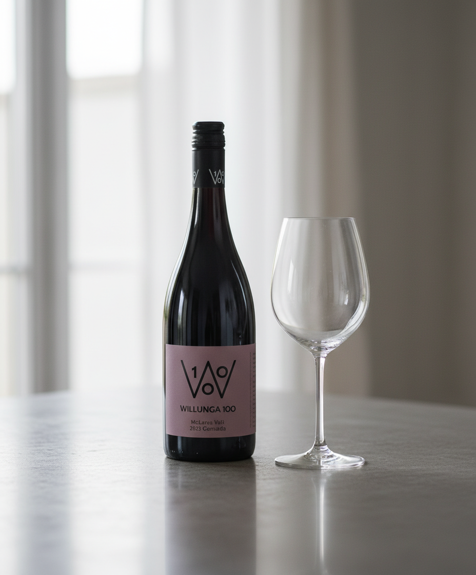 Willunga 100 Grenache 2022 bottle with empty wine glass in portrait position, gallery image 4