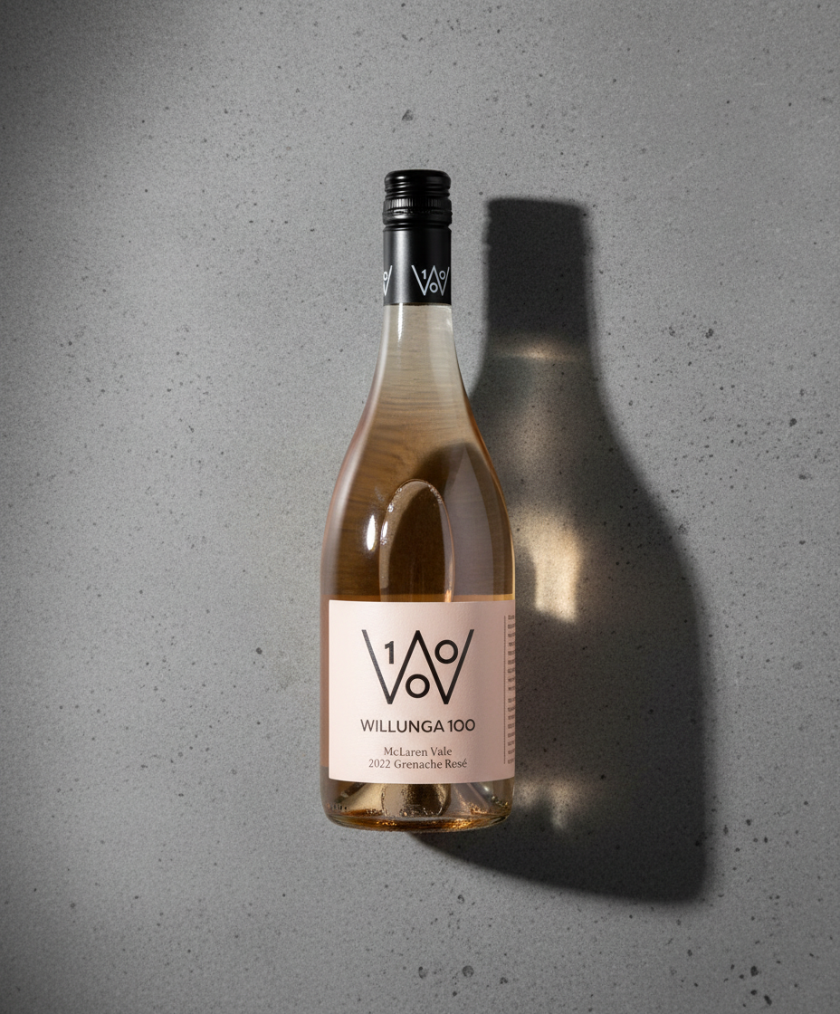 Willunga 100 Grenache Rose 2024 bottle on gray surface with shadow, portrait orientation, gallery position 5