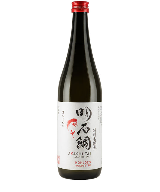 Bottle of Akashi-Tai Honjozo Tokubetsu Sake 72cl with Japanese label and red cap on white background