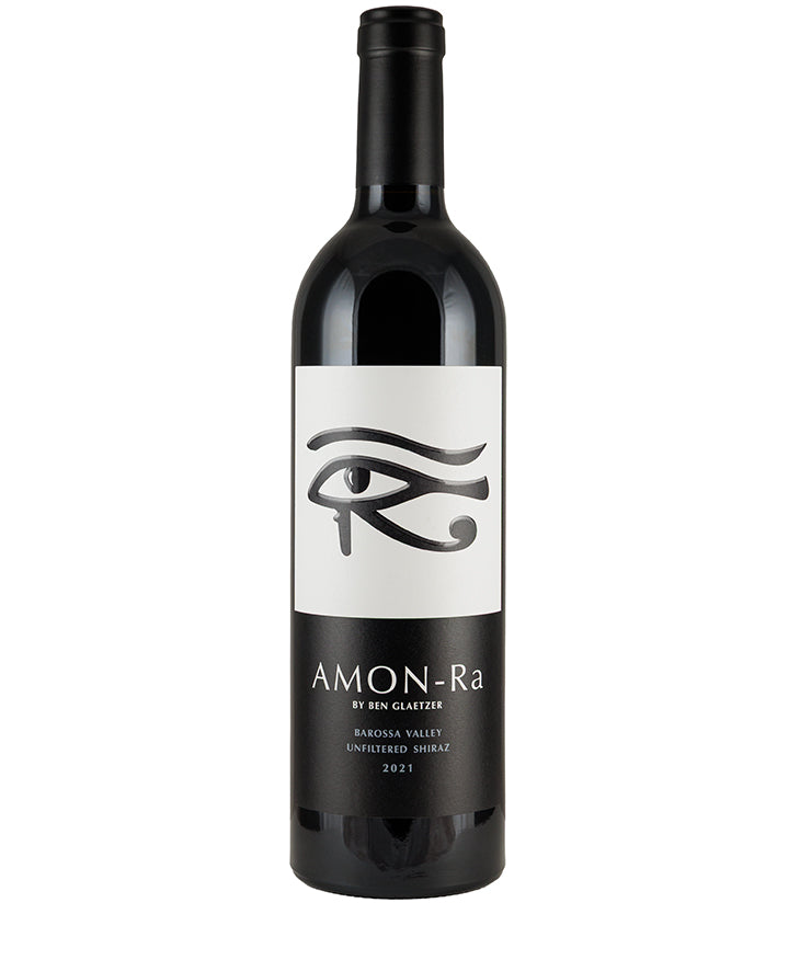 Bottle of Glaetzer Amon-Ra 2021 red wine with a black and white label featuring an eye symbol.