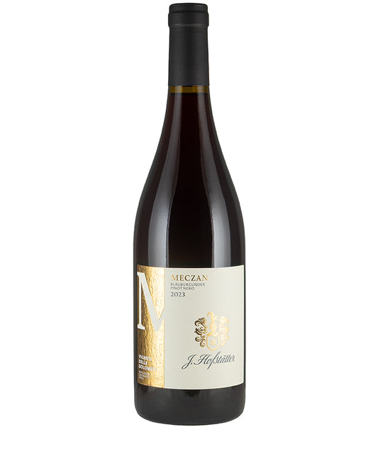 Bottle of Tenuta J Hofstatter Meczan Pinot Nero 2023 red wine with elegant label and dark glass.