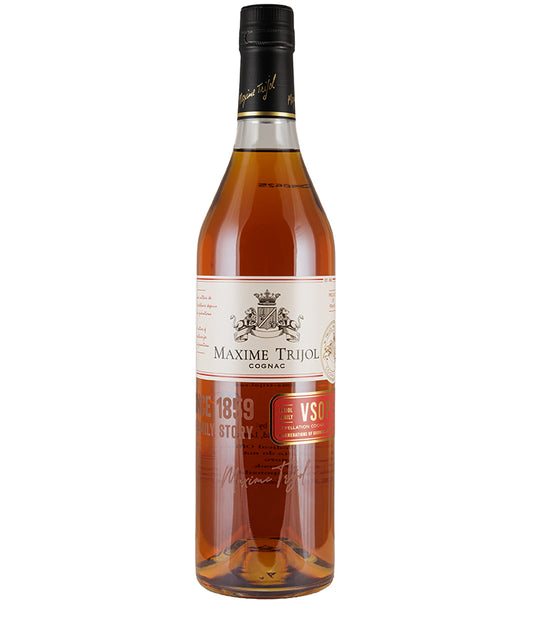 Bottle of Maxime Trijol VSOP Cognac with amber liquid and detailed white label design