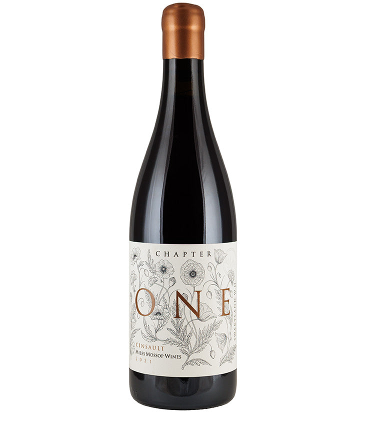 Bottle of Miles Mossop Chapters Cinsault 2021 red wine with floral illustrated label and copper foil capsule