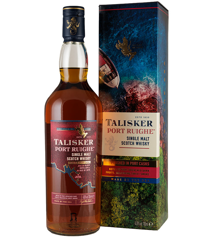 Bottle and box of Talisker Port Ruighe Single Malt whisky with detailed coastal design packaging