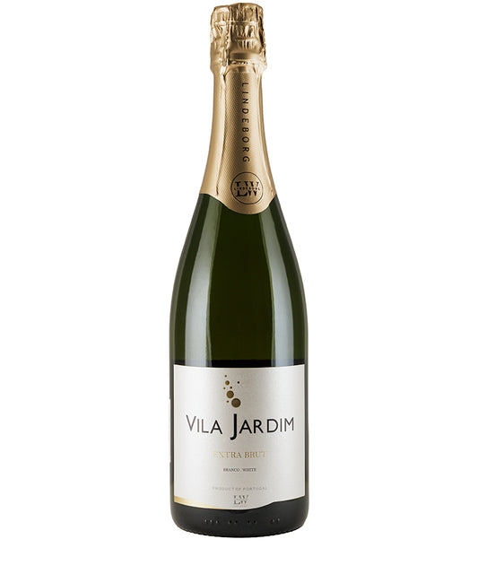 Bottle of Vila Jardim Extra Brut 2021 sparkling wine with gold foil top and white label on green glass bottle.
